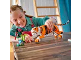 Child playing with tiger