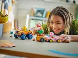Child playing with Mario Kart LEGO.
