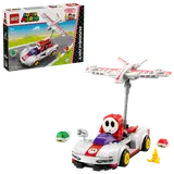 Shy Guy kart with P-Wing next to its box.
