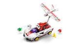 Shy Guy's P-Wing kart in motion with shells.