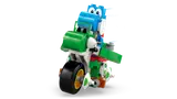 Blue Yoshi riding green motorbike.