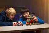 Boys playing with the set.
