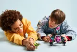 Children playing with Cyber Brain Mech spider.
