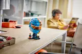 Helmet model on a desk.