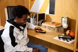 Boy playing with McLaren W1.