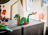 LEGO sea serpent on a cabinet.