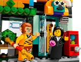 Monkie Kid at a vibrant city shop.