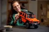 Woman holding LEGO Technic G 500.