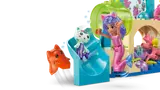 Mermaid Gabby and Pandy Paws on the slide.
