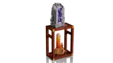 Geode and orange crystal on stand.