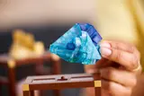 Placing the blue LEGO crystal.