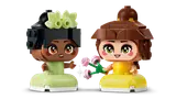 Close-up of Belle and Tiana figures.