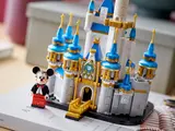 Close-up of castle entrance and Mickey Mouse.
