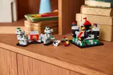 Castle set on wooden shelf.