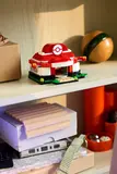 Mini Pokémon Center on a shelf.