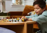 Child playing with Minions set.