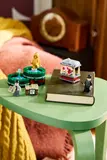 LEGO Ministry set on a green table.