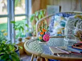 Flowerpot on a rattan table.