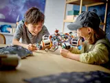 Kids playing with space station