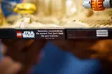 Close-up of Qui-Gon Jinn quote plaque.