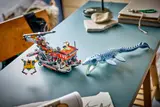 Building the LEGO Jurassic World set.