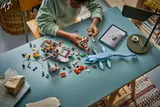 LEGO helicopter docking onto boat.