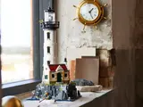 Lighthouse displayed on a windowsill.