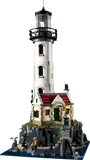 Closer view of the lighthouse cottage and rock details.