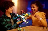 Children playing with Mr. Oz's Spacebus.