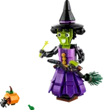 Brick-built witch with broom, wand, pumpkin, and spider.