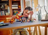 Child playing with Qilin set.