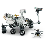 Rover with arm deployed, helicopter landed.