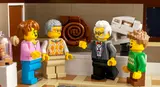 Minifigures discussing a fossil exhibit.