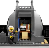 Professor at rooftop office entrance.