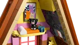 Close-up of cabin interior with cat art and Churro.
