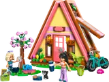 LEGO Friends Glamping Cabin (42682) with minifigures and accessories.