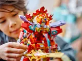 Minifigure held by child.