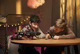 Children playing with the Nightmare Shark Submarine.