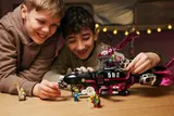 Kids interacting with minifigures on the sub.