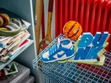 LEGO Nike Dunk display on a metal grate.