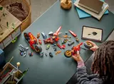 Child building Ninjago set.