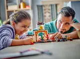 Child and adult enjoying the Ninjago training set.