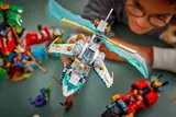 Close-up of ice dragon helicopter in child's hand.