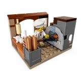 Detailed bakery vignette with chef minifigure and oven.