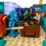 Close-up of ninja minifigures playing billiards.