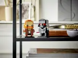 BrickHeadz figures on a shelf.