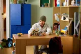 Person at desk with Zelda set.