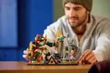 Person admiring Zelda set.