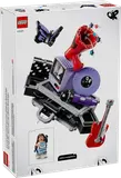Assembled LEGO Olivia Rodrigo set with a touring case, guitar, microphone, vinyl, megaphone, and TV with minifigure.