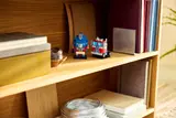 Optimus Prime models on a shelf.